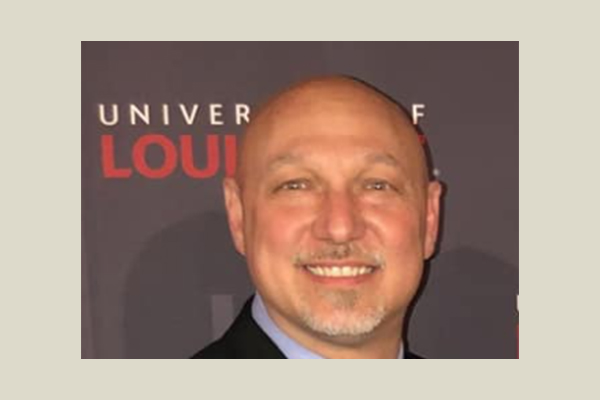 Mark Spivak – 600×400 brown background Photo of Mark Spivak