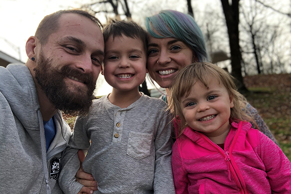Eugene Tsozik -600×400 Eugene Tsozik photo alongside his family: wife, son, and daughter