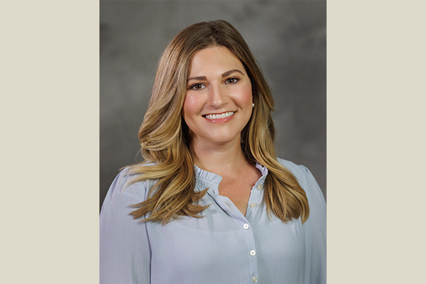 Marianne Krueger – Brown Background – 600×400 Marianne Krueger headshot
